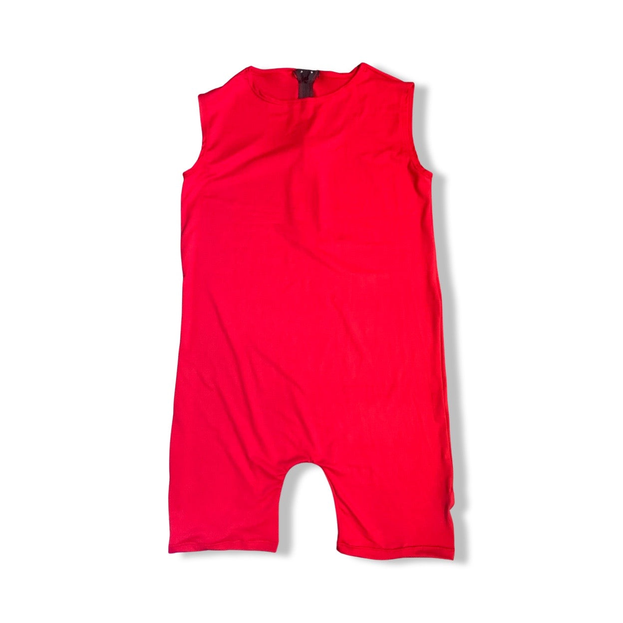 A cute red baby romper with a pocket, featuring a zip back bodysuit. Perfect for your little one!