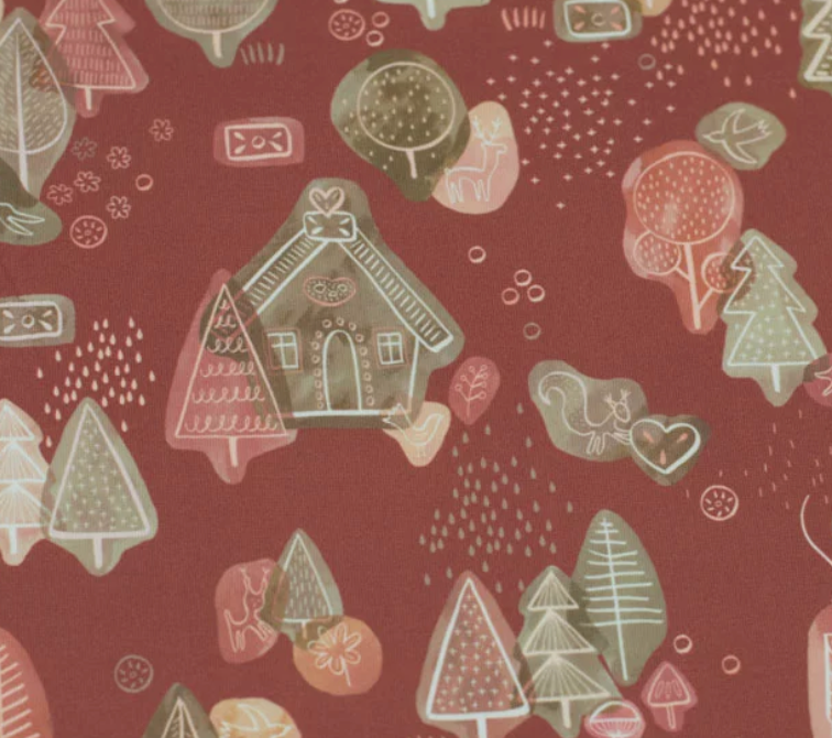 A festive holiday wallpaper featuring red and pink hues, adorned with trees and houses.