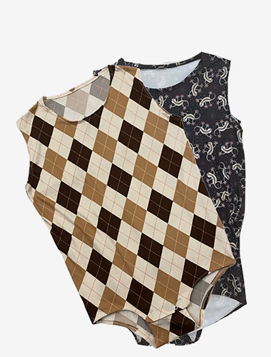 Two adorable baby onesies with a stylish argyle pattern, perfect for your little ones.